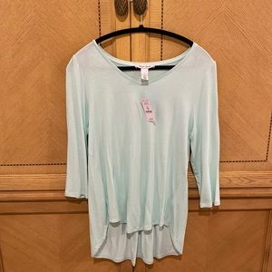 Mint colored long sleeve top.